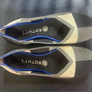Rothy's Black and Cream Flats with Blue Accents